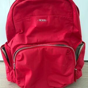 Tumi Vibrant Red Backpack
Large 
Plenty of space 
Lots of inside pockets.